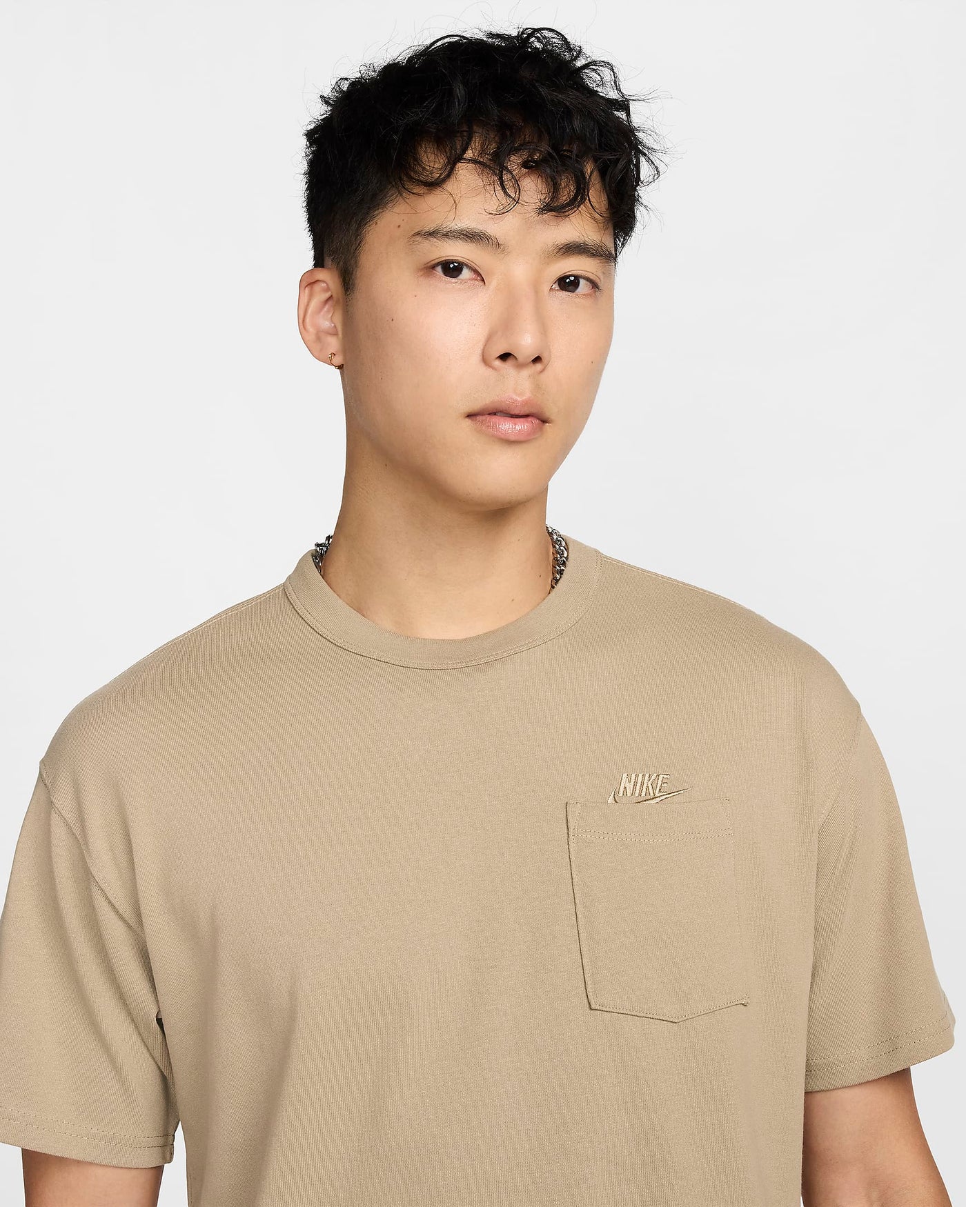 Nike pocket t shirt best sale